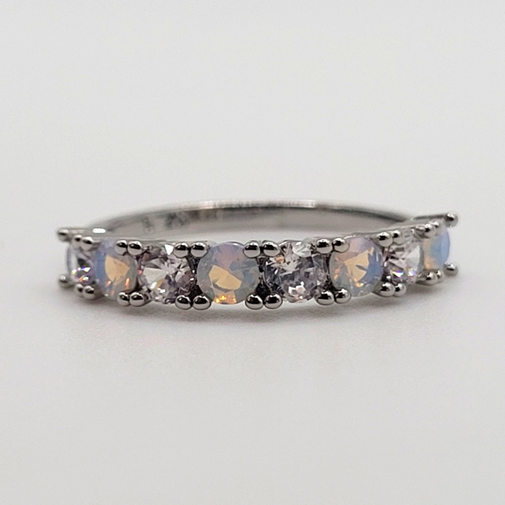 Silver gemstone ring, size 7. Charmed aroma. Appraised